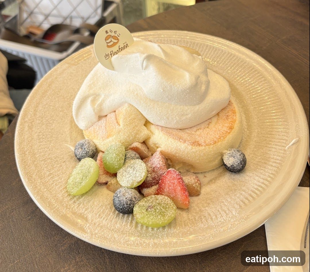 Fluffy Pancakes with Whipped Cream and Fruit