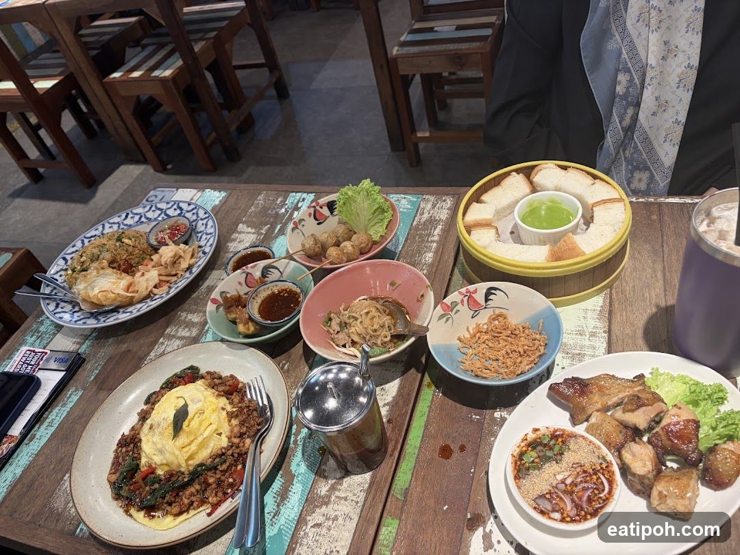 Table with various Thai dishes