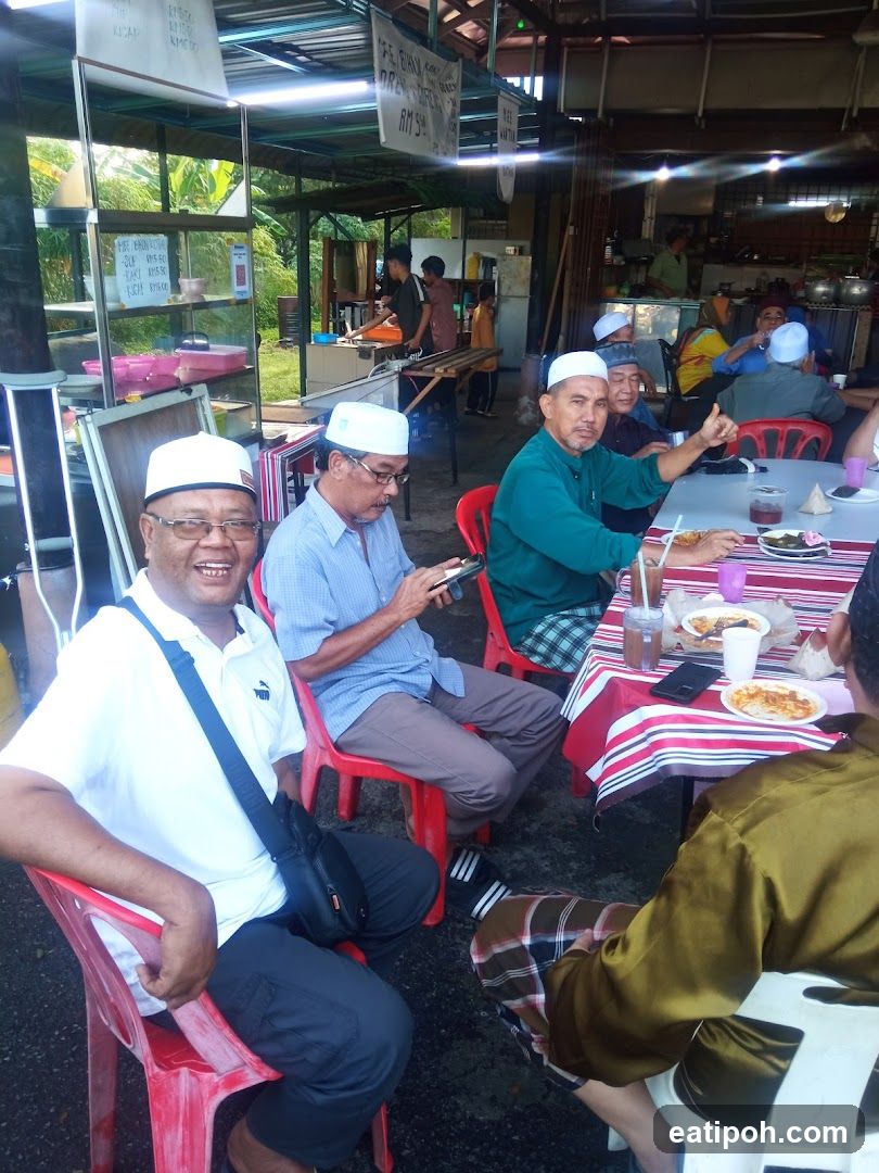 People eating at an outdoor restaurant