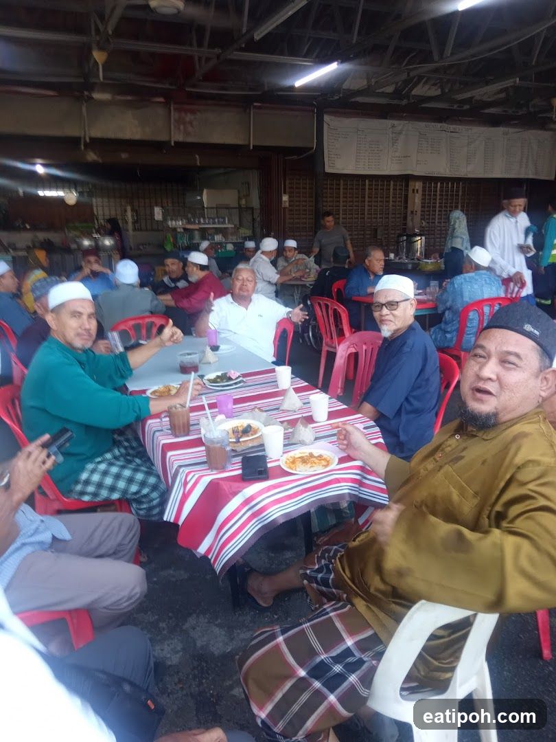 Group of men eating at a restaurant