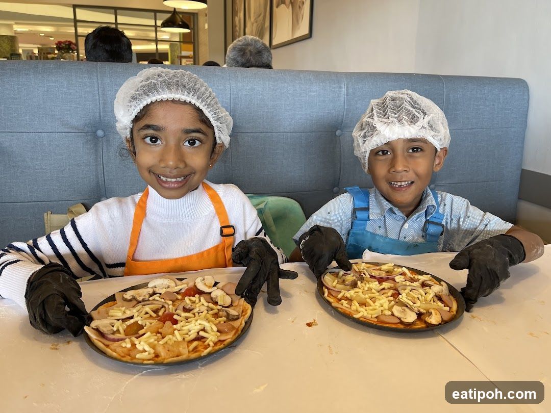 Children making pizzas