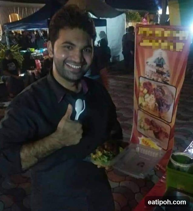 Man with food and menu stand