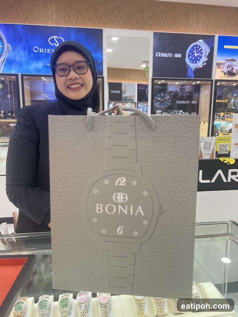 Woman holding a Bonia shopping bag