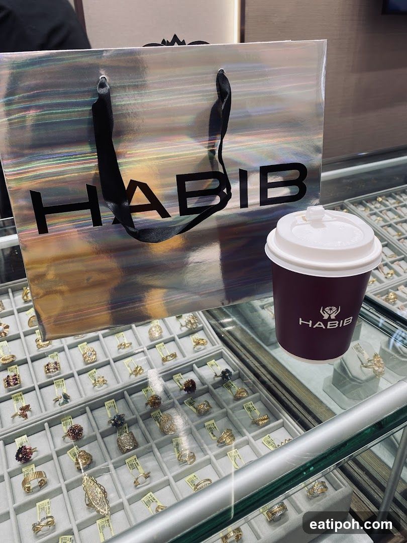 Jewelry Display with Branded Bag and Coffee Cup