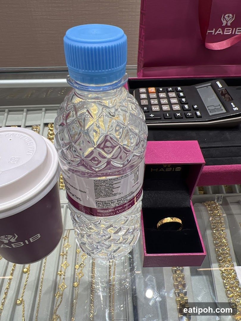 Jewelry Display with Ring and Water Bottle