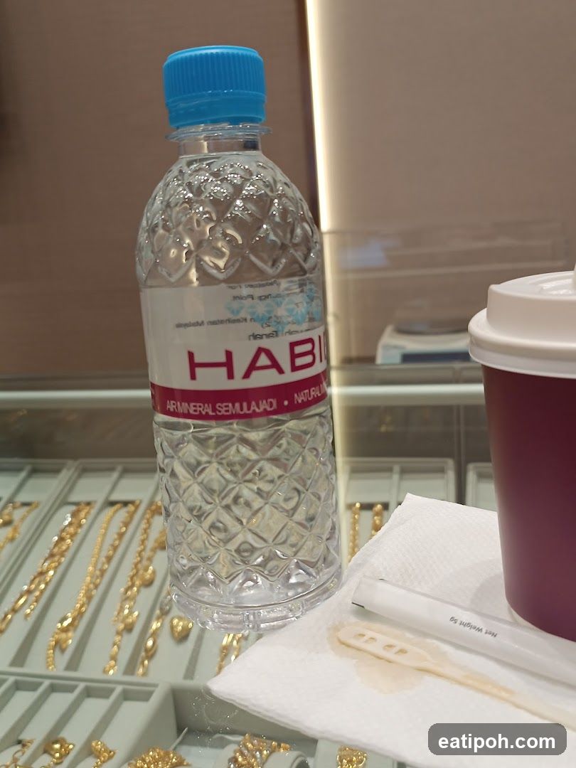 Bottle of Water and Coffee Cup