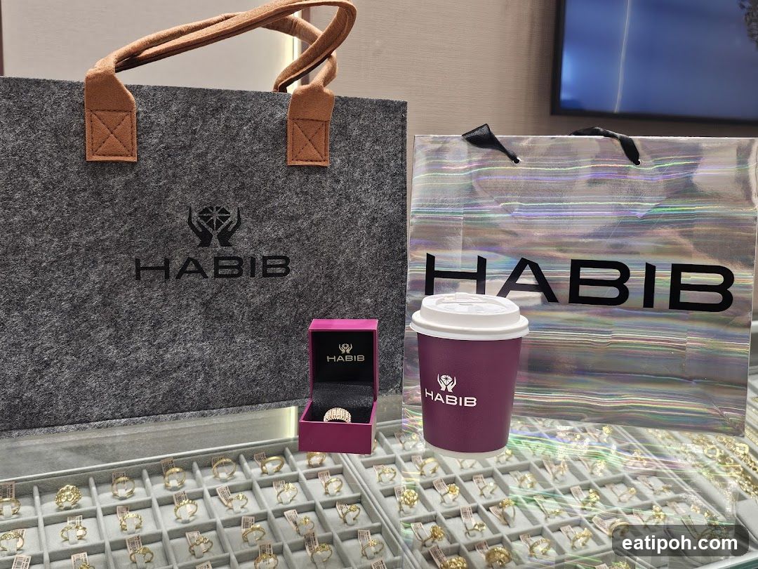 Jewelry display with branded bags and coffee cup