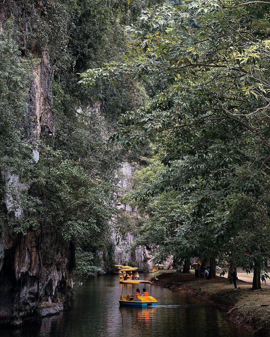 Boat ride on the lake inside Kek Lok Tong cave temple garden