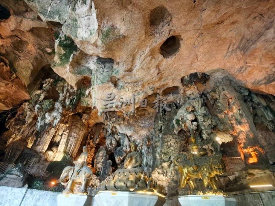 Interior of Kek Lok Tong cave temple with limestone formations after reopening in October 2026