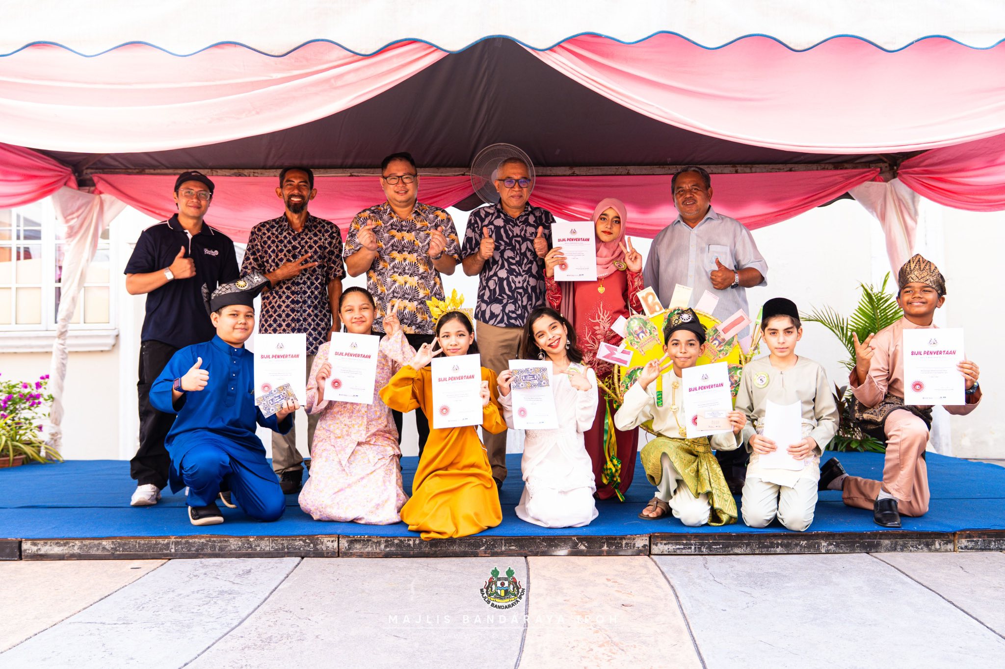 Crowd and craft tables on Lorong Seni at Lorong Panglima during an MBI civic Saturday